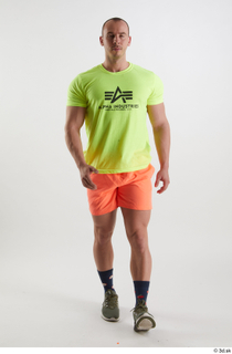 Joel  1 dressed front view green sneakers orange shorts…